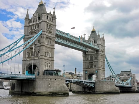 One tower of London Bridge over the River Thames England UK