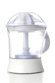 Modern juice extractor isolated on a white background.