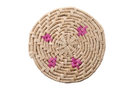 Round handmade colored mat isolated on white background.