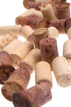 Used corks from bottles guilt isolated white background.