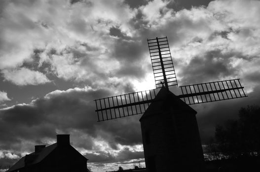 Weathercock of vintage wind mill in Brittany, France