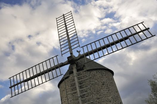 Weathercock of vintage wind mill in Brittany, France