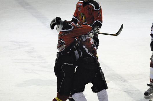 ZELL AM SEE, AUSTRIA - NOVEMBER 28: Salzburg hockey League. Fight between Gollackner and Hahn. Game SV Schuettdorf vs Devils Salzburg (Result 2-13) on November 28, 2010, at the hockey rink of Zell am See