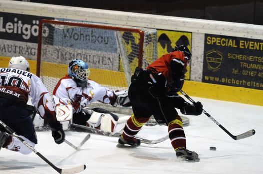 ZELL AM SEE, AUSTRIA - NOVEMBER 28: Salzburg hockey League. Scoring chance for Schuettdorf in the second period. Game between SV Schuettdorf and Devils Salzburg (Result 2-13) on November 28, 2010, at the hockey rink of Zell am See