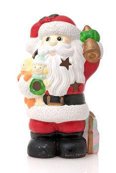 Ceramic Santa Claus isolated on white background.