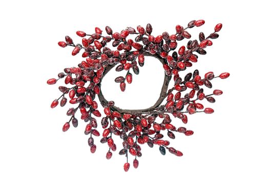 Circular Christmas arrangement branch with red balls on white background.