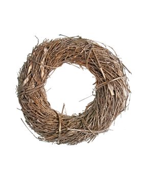 Wreath made with straw isolated on white background.