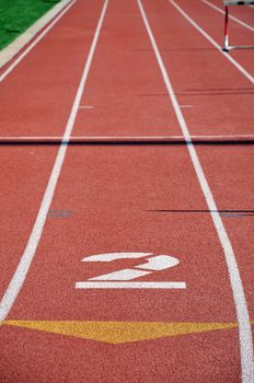 the running lanes of a track on a sunny day