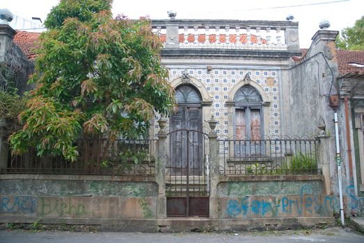 Old house facade with windows.