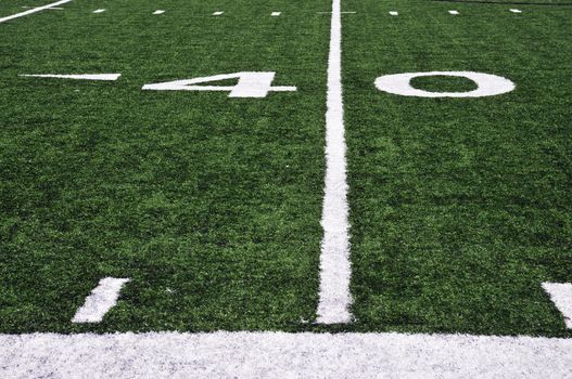 the fourty yard line of a football field and side line markers