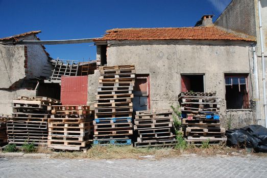 Abandoned store house without roof and windows.