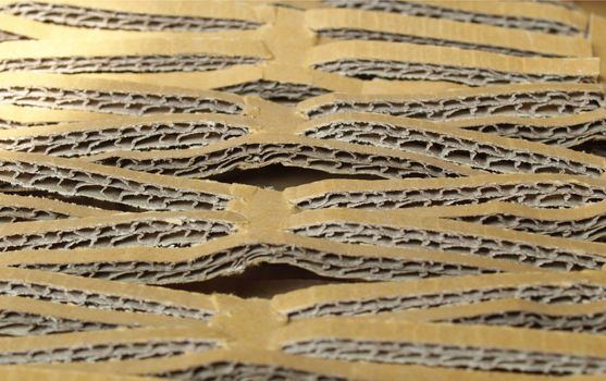 Ecological insulation material for packet packaging made of recycled corrugated cardboard
