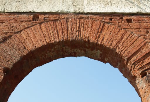 Roman arch with blue sky as copy space