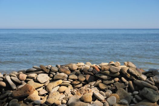 Numerous of pebbles on the stony beach
