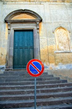 No parking sign in front of Italian church steps
