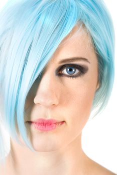 Close-up portrait of a girl with blue hair