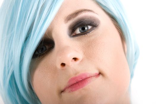 Close-up portrait of a girl with blue hair
