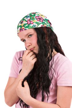 Shy ten year old girl in timid pose wearing a bandana