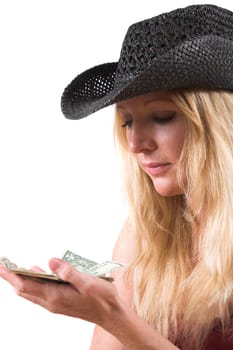 Woman looking at the money in her hand