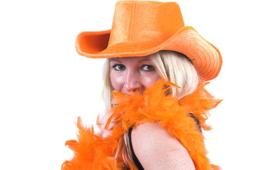 Pretty blond woman wearing an orange boa and orange hat