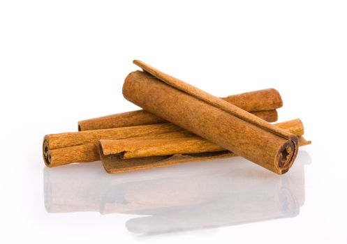 Fresh cinnamom sticks on isolated white background 