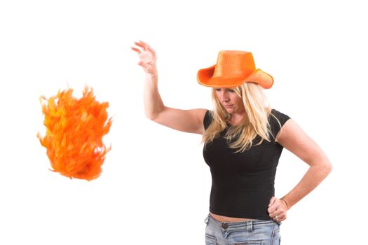 Blond woman throwing away her orange boa after her team has lost the game