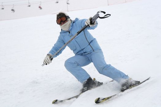 The skier in a blue 