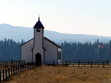 old country church at the foot of the rocky mountains