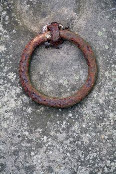 One of four handles on a heavy grave cover on an 18th century graveyard in Hamburg/Germany.