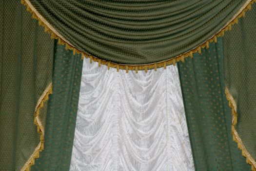 Drapery at a window. Green