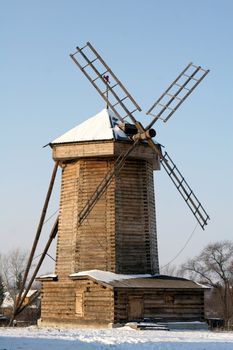 old wooden mill in the winter