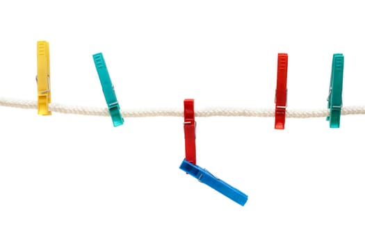 Colour clothes-pegs hung on linen rope, insulated on white background