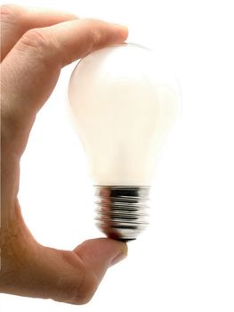 Man's hand holding light bulb on the white background