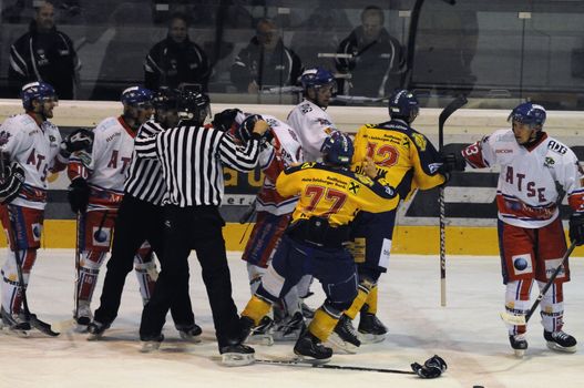 ZELL AM SEE, AUSTRIA - NOVEMBER 30: Austrian National League. Fight between Volker Keidl and Florian Graf. Game EK Zell am See vs. ATSE Graz (Result 0-4) on November 30, 2010, at hockey rink of Zell am See