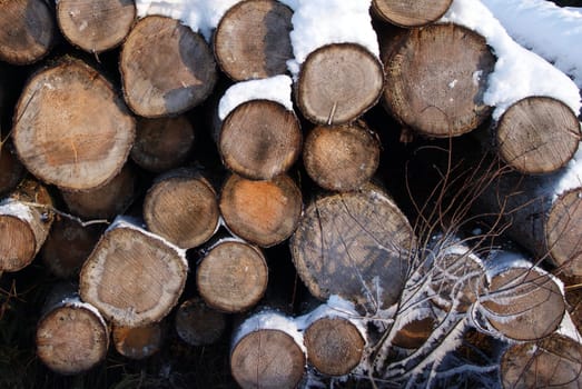 A stack of firewood in winter snow, suitable for background. Photographed in Salo, Finland.