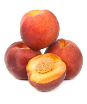 close-up heap of ripe peaches, isolated on white