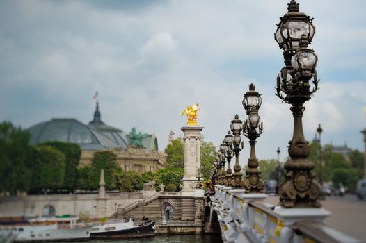 The Alexander III Bridge across Seine river in Paris, France