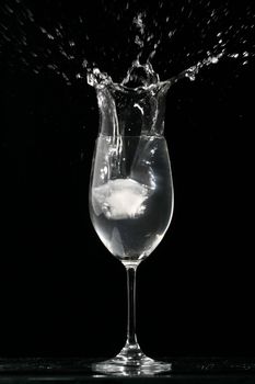 alcohol splash on black  background