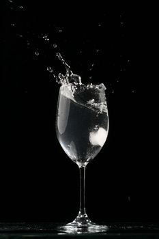 alcohol splash on black  background