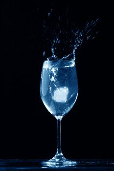 alcohol splash on black  background