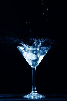 alcohol splash on black  background