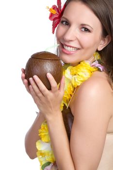 Tropical woman drinking from coconut