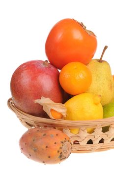 Basket with fresh fruit isolated on white background