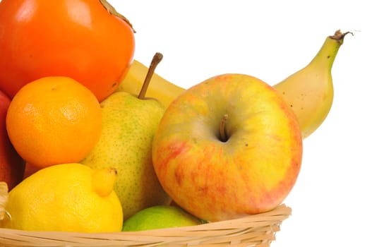 Basket with fresh fruit isolated on white background