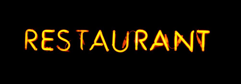 Restaurant red neon sign on black background