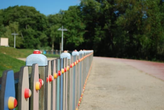 beautiful and colored fence on a urban park 