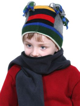 Four year old boy in crazy looking winter cap and a red sweater.  Shot with the Canon 20D.