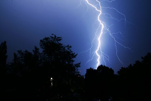 Thunder on the night sky background