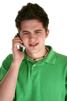 Attractive eighteen year old male with cellphone over white.