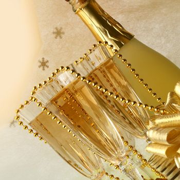 holiday card golden champagne and gift